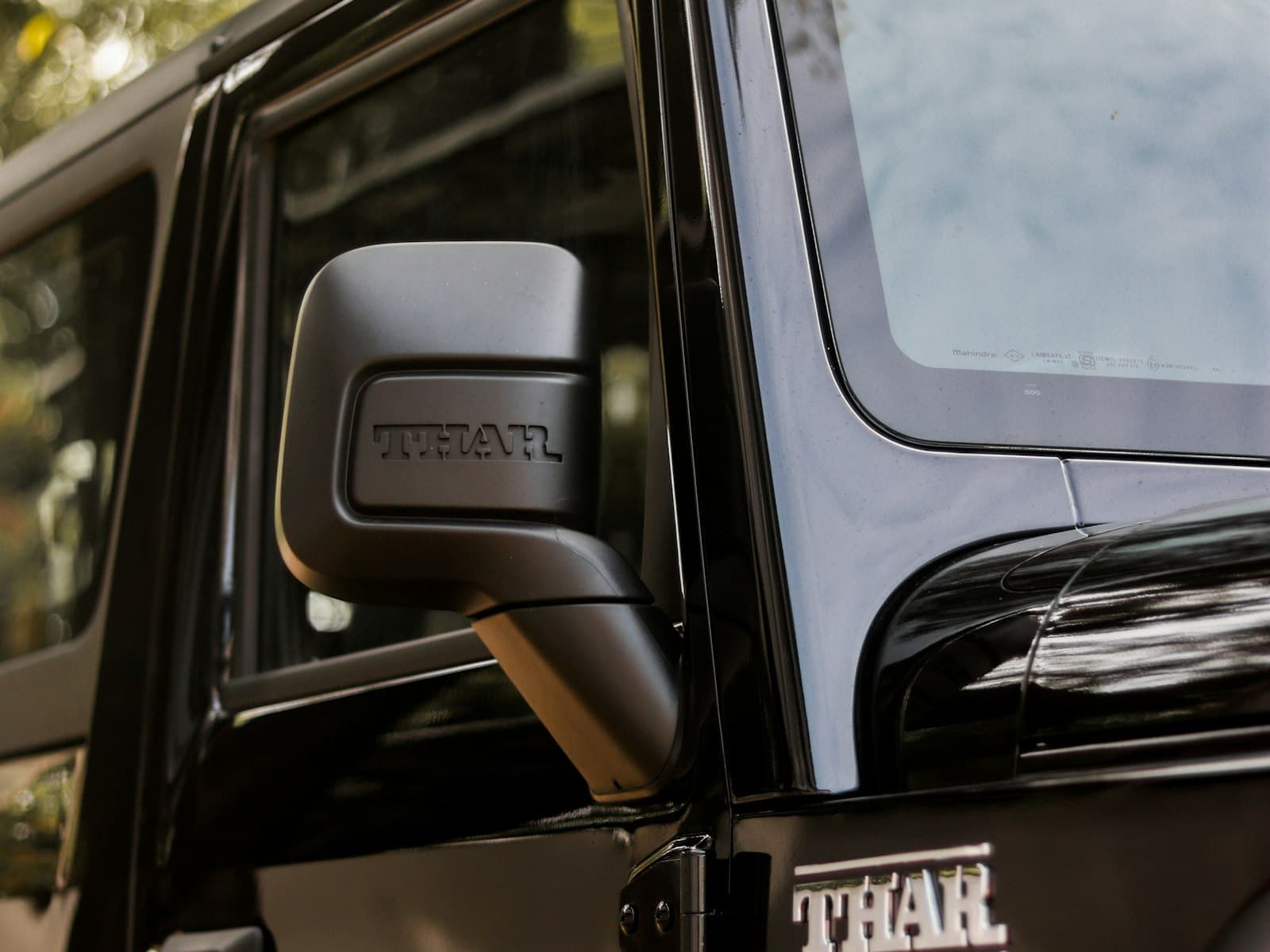 A modified Mahindra Thar on a road
